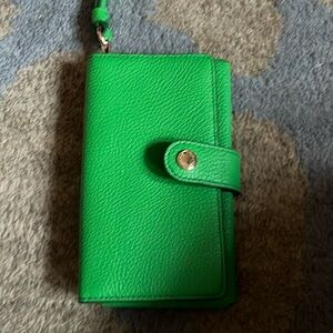 Small Coach wallet with snap. Green pebble leather.